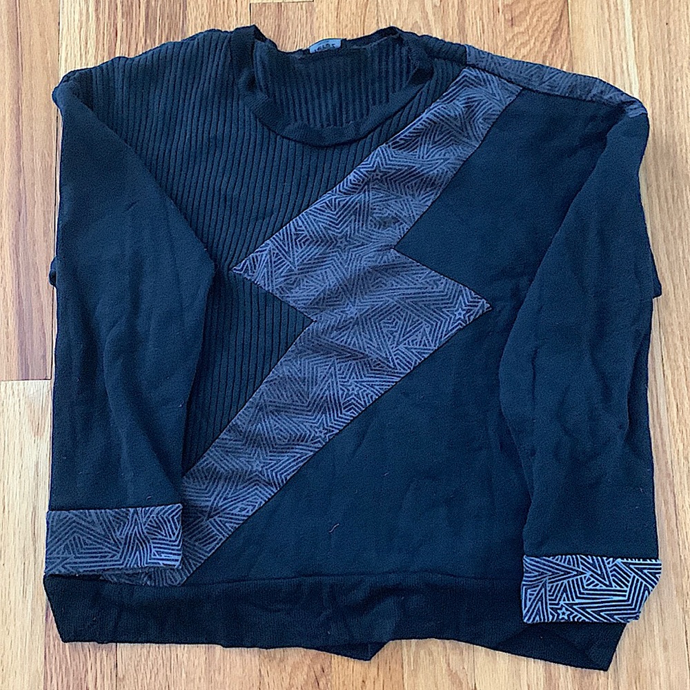 Terez sweatshirt with star pattern and lightning bolt on front